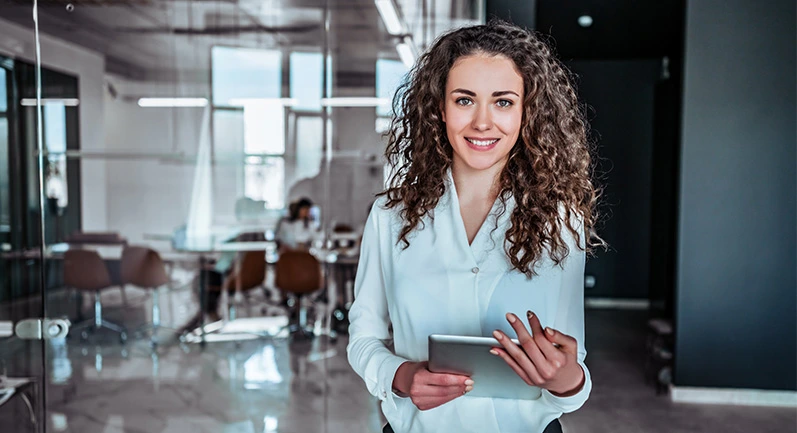 woman holding an IPad